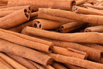 Cinnamon sticks closed up food background