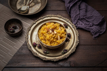Moong Dal Halwa or Mung Daal Halva is an Indian traditional dessert, served in metal bowl