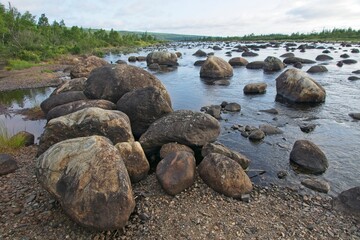 Fototapeta na wymiar Large stones in Gambo Brook in Newfoundland Canada
