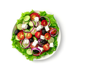 Fresh vegetable salad with olives, and cheese isolated on a white background.
