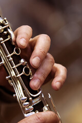 Fototapeta premium Clarinet musician fingers close up