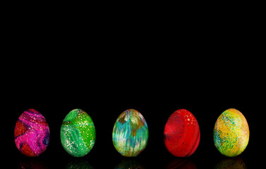 beautiful colorful easter eggs on a black background