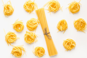 pasta on a white plate, raw pasta, spaghetti on a white plate 