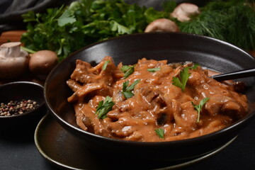 Traditional beef stroganoff with cremini and champignons