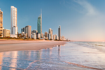 Early morning, Surfers Paradise Beach. This popular beach is on the Gold Coast, Queensland, Australia and is popular with tourists and locals alike. - obrazy, fototapety, plakaty