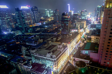 Shanghai aerial night view from above with city skyline and skyscrapers in China.