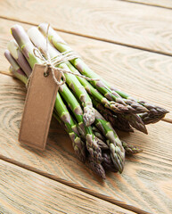 Fresh green asparagus with empty tag