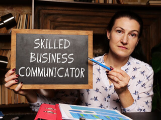 Financial concept meaning SKILLED BUSINESS COMMUNICATOR with phrase on the board