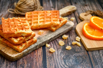 Traditional Belgian waffles, blood oranges and  sugar for sweet breakfast