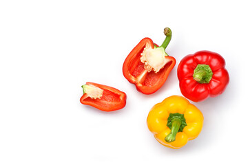 Flat lay of Red and yellow bell pepper with slices isolated on white background.