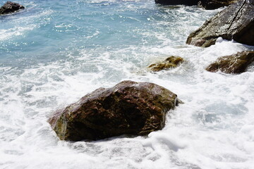 waves breaking on the rocks