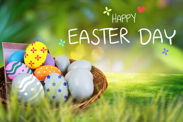 Happy Easter,Decorated Easter Eggs in green grass background.