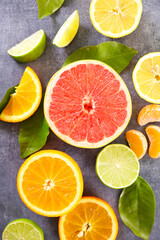 Fototapeta na wymiar citrus fruit and leaf- top view