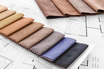 House plans and fabric samples, closeup