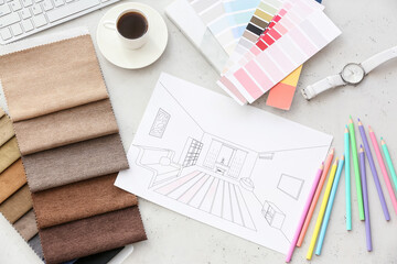 House plans, color palettes and fabric samples on light background