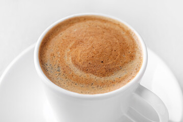 Cup of tasty hot coffee, closeup