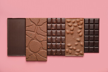 Different chocolate on color background