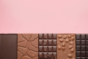 Different chocolate on color background