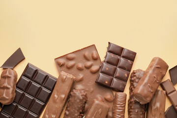 Different chocolate on color background