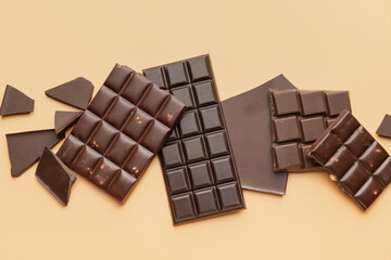 Different chocolate on color background