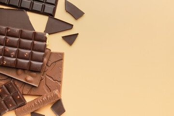 Different chocolate on color background