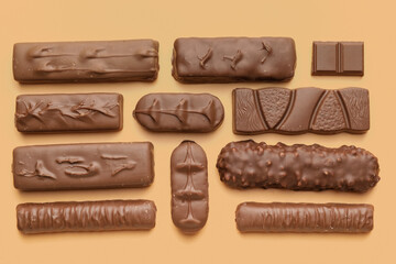 Different chocolate on color background