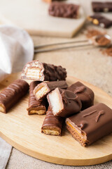 Sweet chocolate bars on table