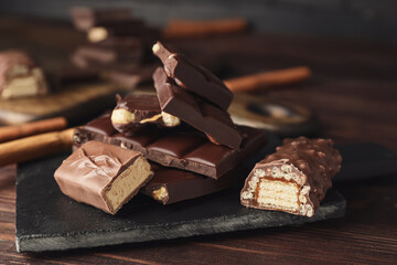Sweet chocolate on wooden background