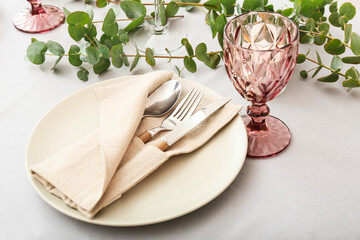 Beautiful table setting on light background