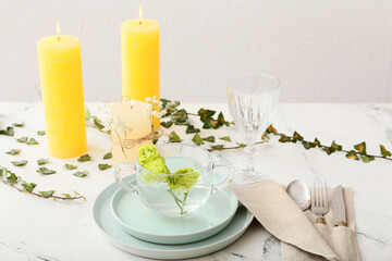Beautiful table setting on light background