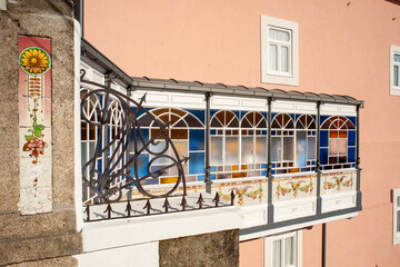 glazed pergola on a facade of the Ribeira district in Porto,, Portugal