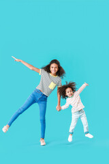 Portrait of cute African-American sisters on color background