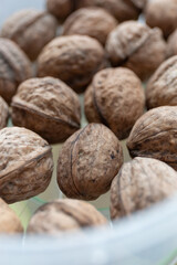 Close up of walnuts on a kitchen table in a container