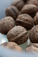 Close up of walnuts on a kitchen table in a container