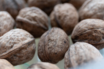 Close up of walnuts on a kitchen table in a container