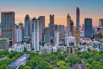 Fototapeta na wymiar city skyline at sunset on a rooftop in Bangkok
