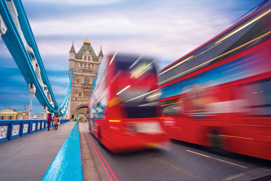 view of Tower Bridge with fast moving double decker bus
