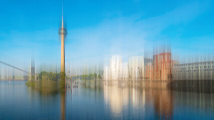 Obraz premium Abstrakt Mehrfachbelichtung Medienhafen mit Fernsehturm in Düsseldorf Rhein