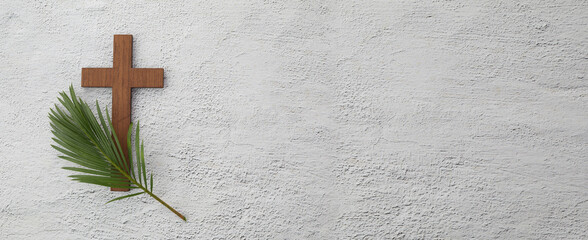 Palm sunday background. Cross and palm on grey background.