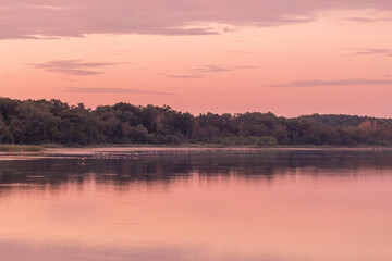Obraz na płótnie Canvas Sonnenaufgang über eienm See