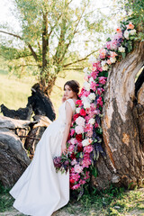 bride on the background of a decorated tree