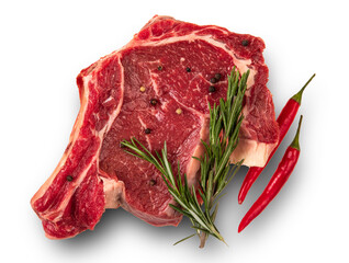 Raw meat on the bone. Pepper pods, rosemary. White background. Top view.