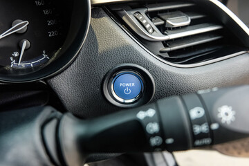 Close up engine car start button. Start stop engine modern new car button,Makes it easy to turn...