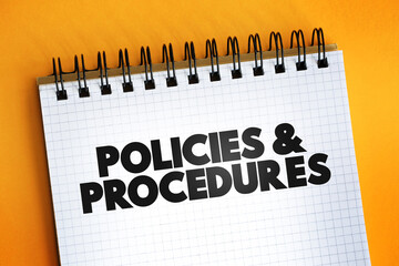 Policies And Procedure text quote on notepad, concept background.