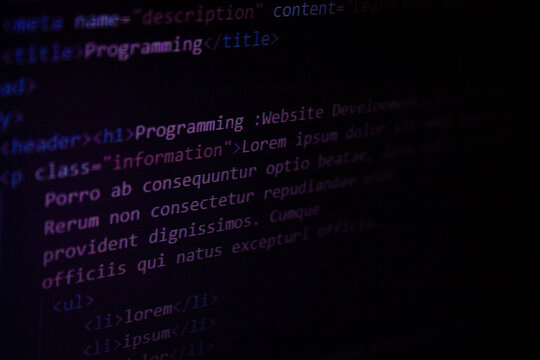 Closeup image of coding.Coding.Programming.Developing a webpage.Front-end development.Computer science.Programming languages.Web development languages.Front-end development languages.
