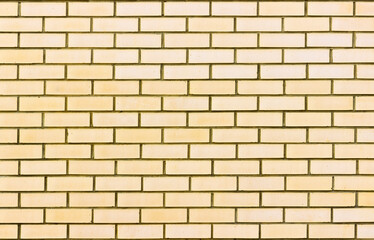 Abstract of a light yellow brick wall background