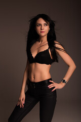 Fototapeta premium portrait of a brunette girl in an open top