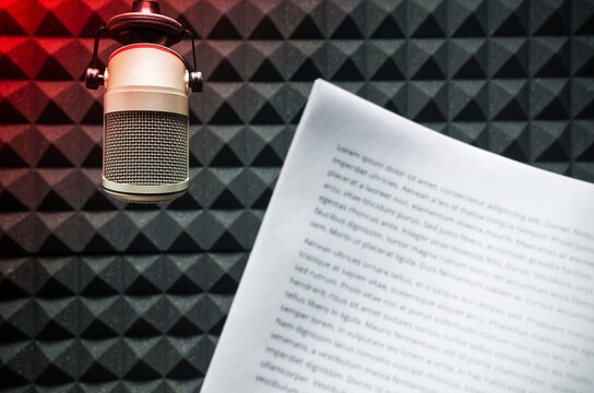 microphone and a sheet of paper with text