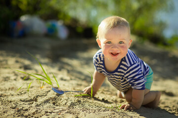 the kid went on a hike, a sandy beach. Travel and tourism, selective focus