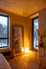 Stylish bedroom interior in natural boho style